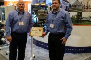 14 0910 Navien NCB Wins Comfortech Product Showcase Award Brian Fenske + Eric Ashley3